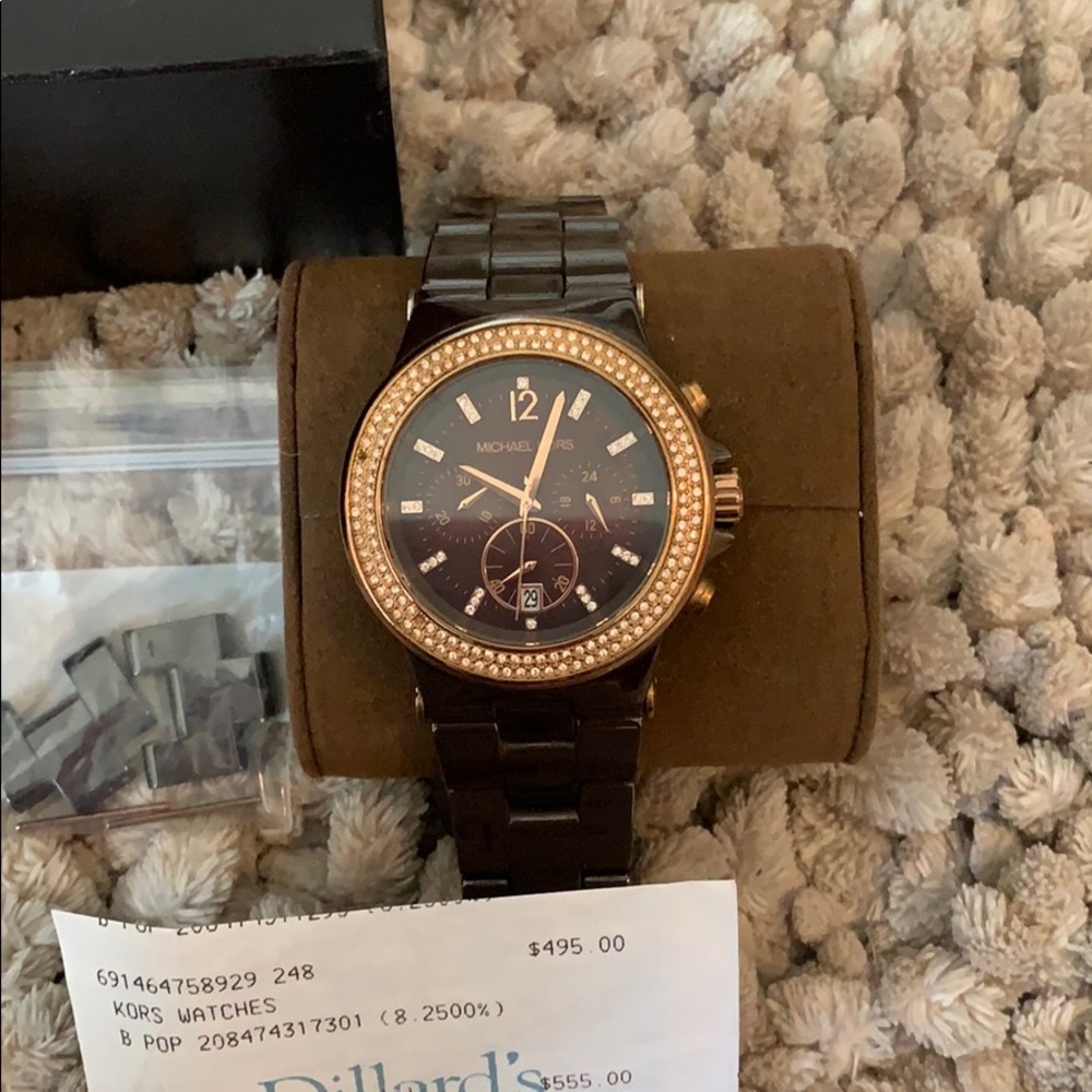 Michael Kors dark brown encrusted metal watch.